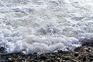 Sea waves on the beach. Selective focus. Summer nature background