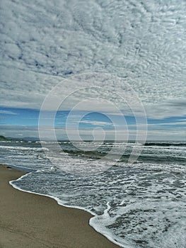 Sea waves blue sky