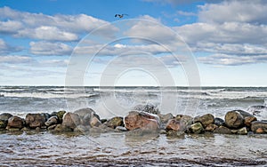 Sea waves breaking on the rocks