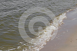 Sea waves crash on the shore