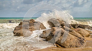 sea waves crashing on the rocks