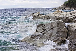 Sea waves crushing on rocks