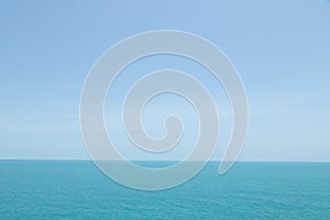 Sea waves in ocean wave splashing thinly ripple water. Blue water and sky background. Leave space to write messages.