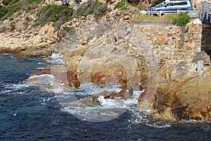 Sea Waves By Old Brick Fence