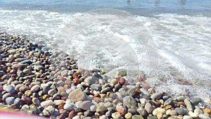 Sea waves on a pebble beach