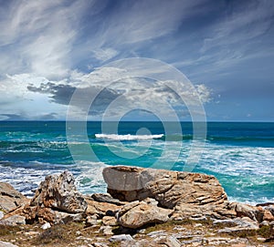 Sea, waves and rocks on coast of beach in Malaysia for outdoor travel in summer for vacation or holiday. Ocean