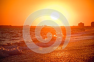 Sea waves. Sea of Crimea. High waves at sunset. Sunny day at sea. Background blue waves. Sand beach. Clean beach