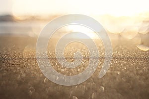 Sea waves and warm sunset light, calm and relaxing sandy beach