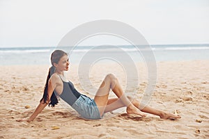 sea woman beach vacation freedom sand smile holiday nature sitting travel
