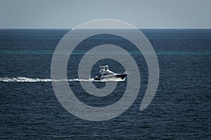 Sea with a yacht in Cancun