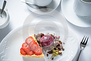 Sea â€‹â€‹buckthorn cake with fruit sorbet, strawberries