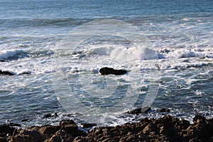 Seacape waves in the beach