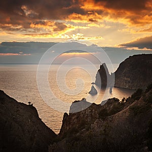 Seacoast with cliffs at sunset