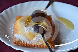 Seadas - traditional Sardinian cheese fritter with honey photo