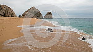Seafoam on Divorce and Lovers Beach on the Pacific side of Lands End in Cabo San Lucas in Baja California Mexico