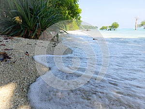 Seafoam flooded laxaman pur beach  of  andaman nikobar island