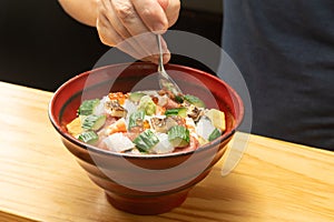 Seafood bowl made by a Japanese sushi chef photo