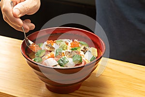 Seafood bowl made by a Japanese sushi chef photo