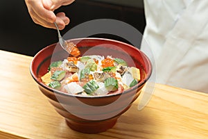 Seafood bowl made by a Japanese sushi chef photo