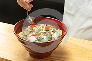 Seafood bowl made by a Japanese sushi chef photo