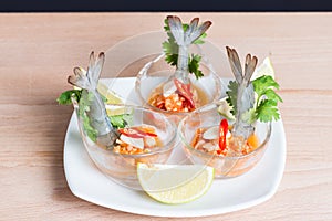 Seafood cocktail prawn in spicy seafood dip