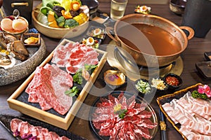 Seafood cuisine plate and beef sliced meat hot pots. pork scallops, seashells, oysters, caviar seafood delicacies