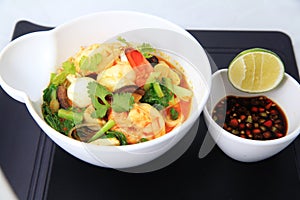 Seafood curry asian food in bowl, shrimp prawn with quail egg mixed with vegetables