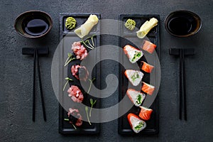 Seafood delicatessen sushi rolls set on plates