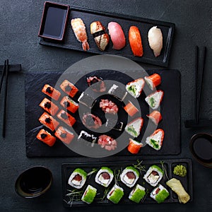 Seafood delicatessen sushi rolls on slate
