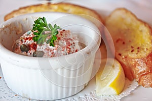 Seafood Dip in ramekin with Garlic Toast