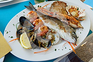 Seafood fish platter in Valun Cres island Croatia with tuna fish shrimps and mussels