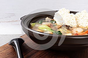 Seafood Fried Glutinous Rice Soup with Seafood and Vegetables and Fried Glutinous Rice