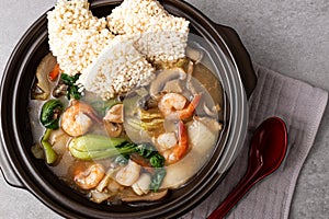 Seafood Fried Glutinous Rice Soup with Seafood and Vegetables and Fried Glutinous Rice