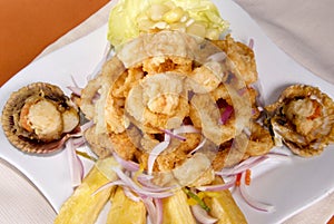 Seafood jalea, jalea de mariscos is a traditional and very popular Peruvian food photo