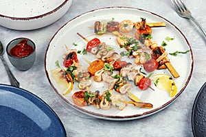 Seafood kebabs fried on sticks