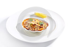 Seafood lasagna portion closeup