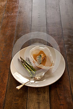 Seafood meal of Lobster bisque soup in a seashell bowl