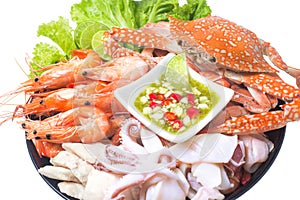 Seafood mixed with spicy sauce thai food traditional isolated on