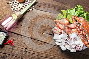 Seafood mixed thai food traditional on wooden background ingredient