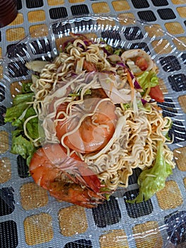 seafood noodle and salad known  as kerabu maggi