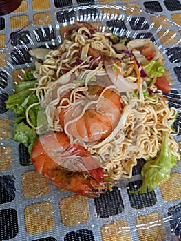 seafood noodle and salad known  as kerabu maggi