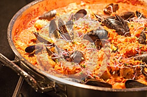 Seafood paella in fry pan