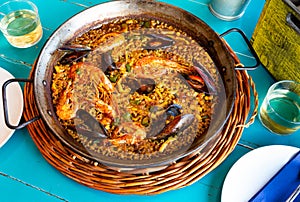 Seafood paella in traditional paella pan