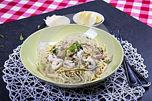Seafood Pasta on Marble Board With Red Checkered Tablecloth