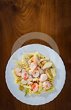 Seafood pasta in sweet and sour sauce