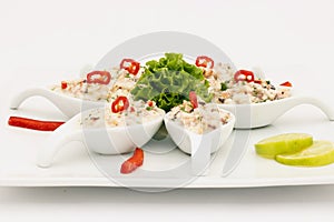 Seafood Peruvian dish: Pichanga de Mariscos. Ceviche style with white cream. photo