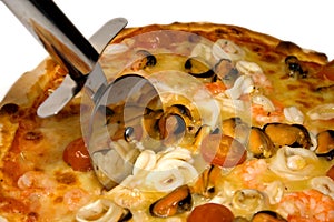 Seafood pizza and cutter