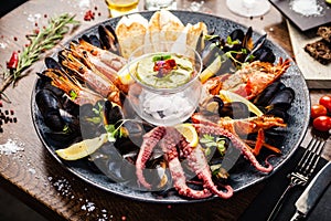 Seafood platter for 2-4 persons. Lobster, octopus, blue mussels, Argentina king prawns, tuna tartare. Delicious healthy