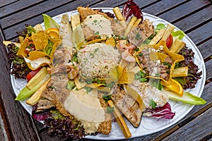 Seafood platter Plato pescado mixto. Different kinds of fish, sauce, beans, rice, lettuce leaves. Mexican Cuisine photo