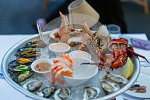 seafood platter with prawns shrimp crabs Balmain bugs oyster clams in a Sydney CBD